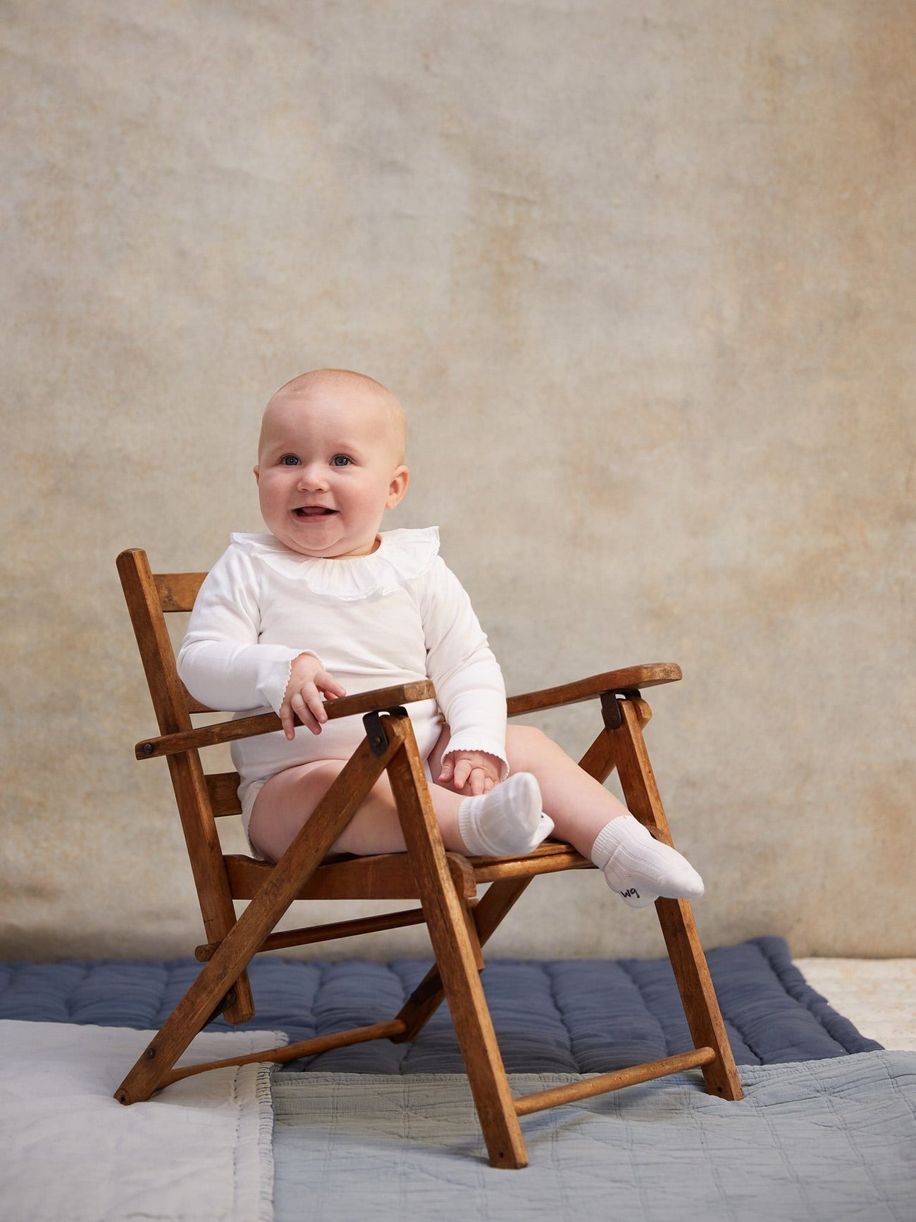 White Laya Long Sleeve Baby Bodysuit