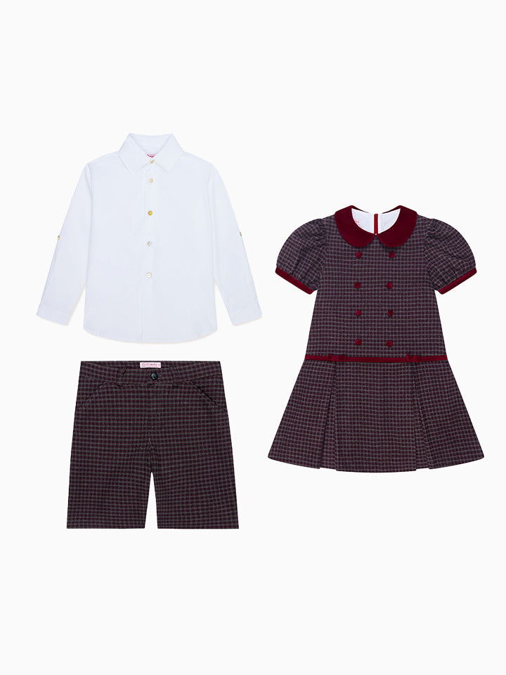 Elegant children's clothing set featuring a white shirt, burgundy plaid dress, and matching plaid shorts, ideal for formal occasions.
