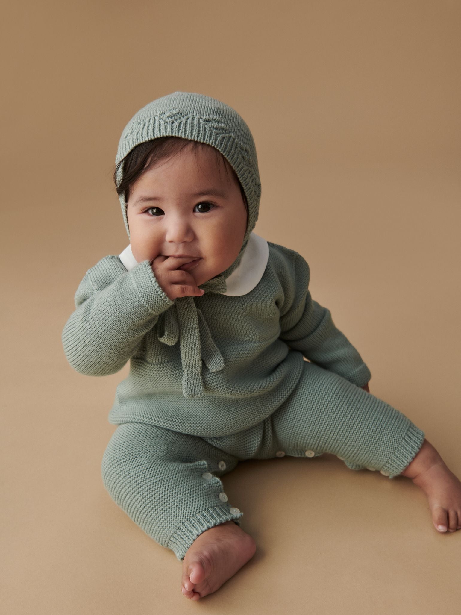 Sage Rumi Merino Baby Knitted Playsuit